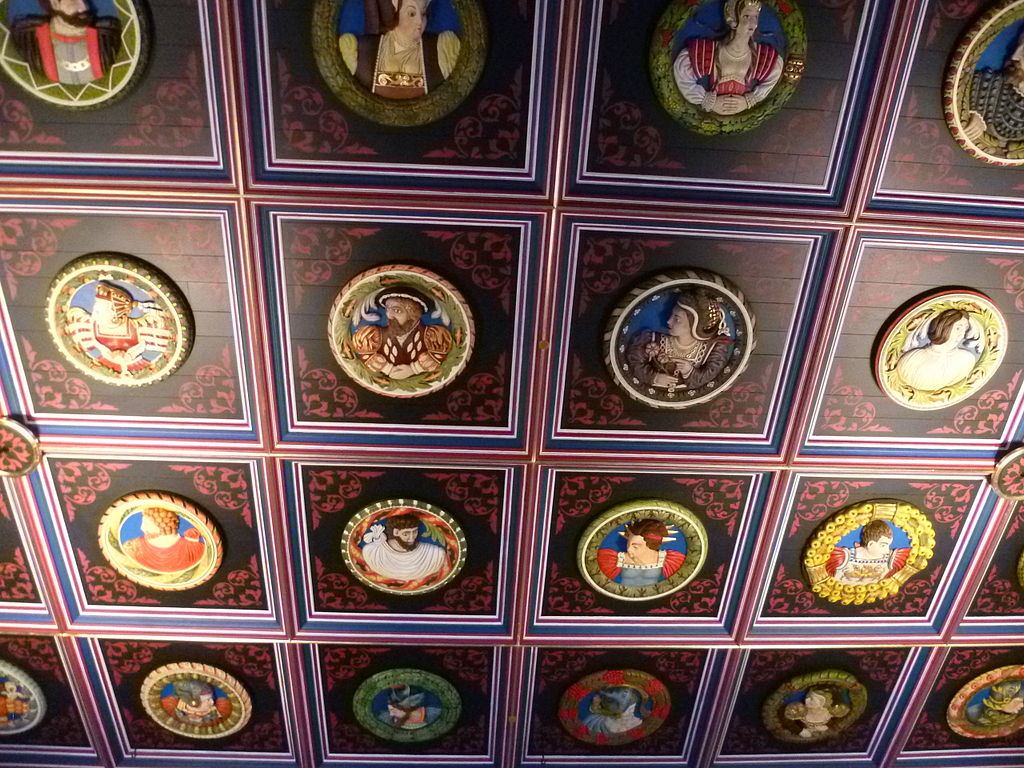 Part of the restored ceiling incorporating replicas of the 16thC carved oak roundels known as the Stirling Heads